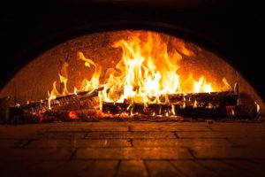 wood fire Pizza oven heating up